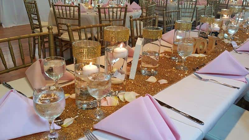 Round tables and chandeliers ready for an evening event
